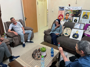 Members of the Parents Circle meeting with the al-Hallaq family yesterday